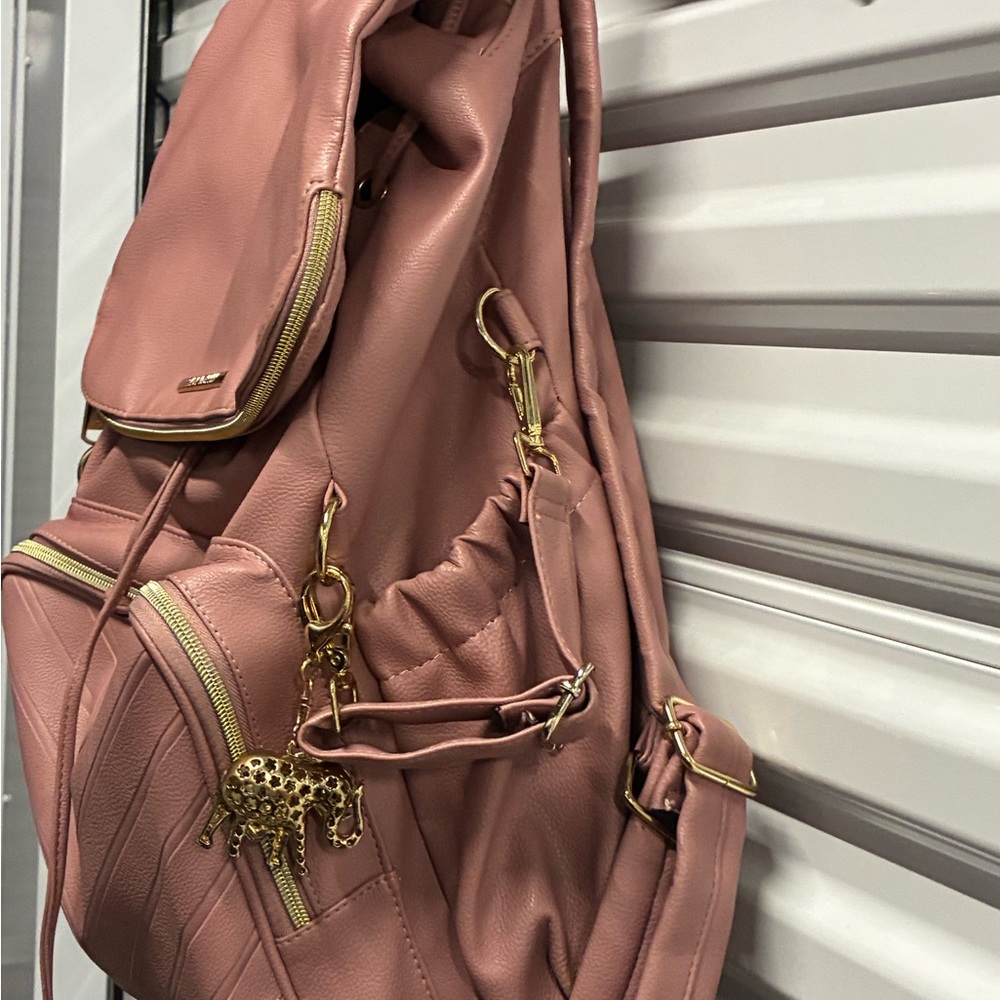 Chic Pink Backpack with Gold Accents